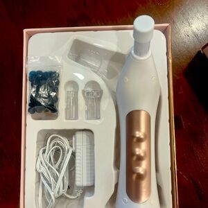 RejuvadermMD portable microdermabrasion device